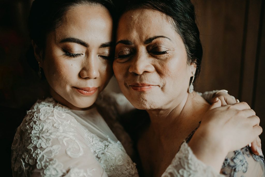Bride and her mom at St Anthony's church and Comis hotel wedding