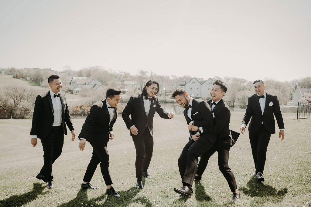 Groom and his groomsmen at St Anthony's church and Comis hotel wedding