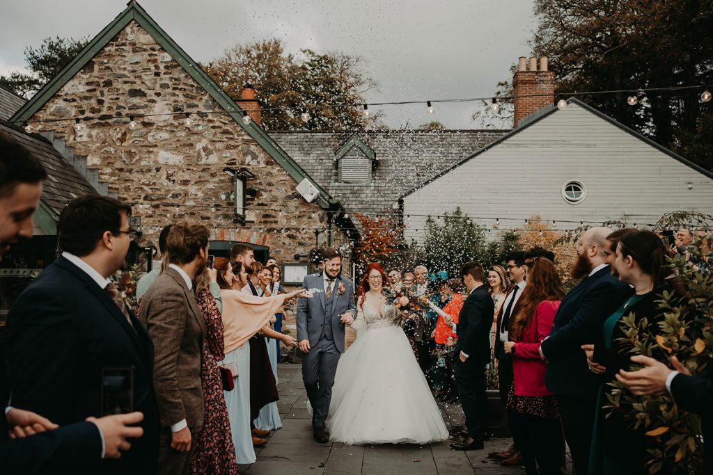 Confetti throw at Bodnant Welsh Food, North Wales autumn wedding